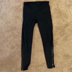 Fabletics Black Leggings zipper and sheer panel with rose design on calves